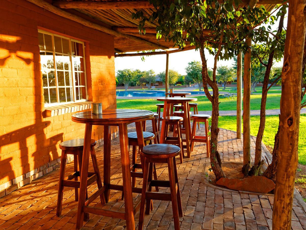 Gondwana Damara Mopane Lodge Mopane Pos ภายนอก รูปภาพ